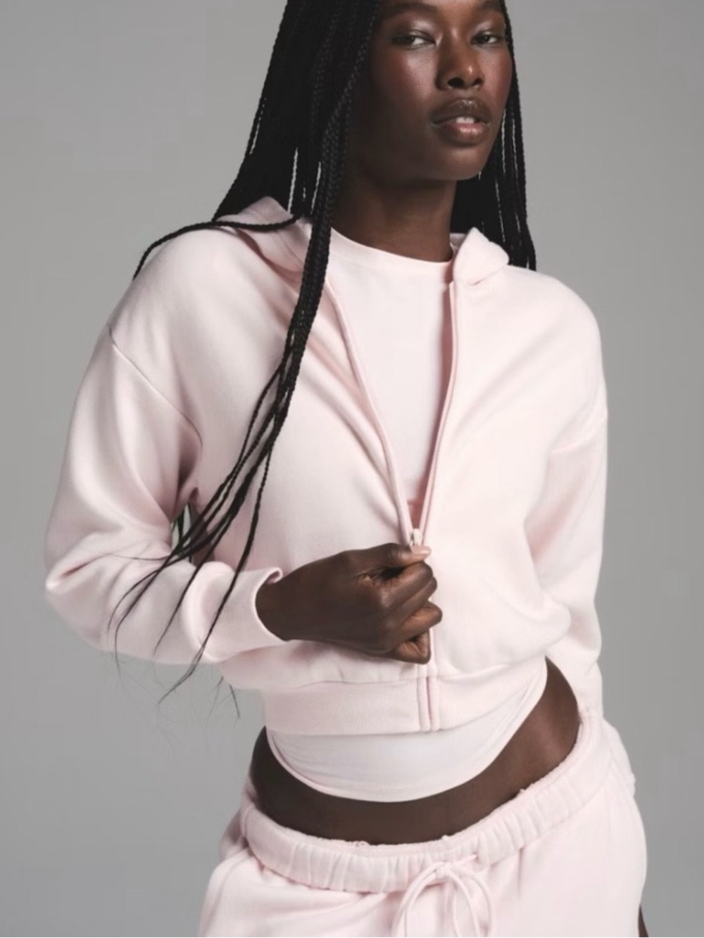 SKIMS Cotton Fleece Shrunken Zip-Up Hoodie in Barely Pink